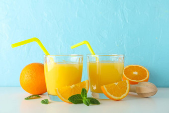 平躺作文新鲜的橙色果汁木榨汁机薄荷橙子木榨汁机白色表格颜色背景空间文本新鲜的自然喝水果