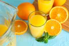 作文新鲜的橙色汁玻璃器皿薄荷切割董事会橙子颜色背景特写镜头新鲜的自然喝