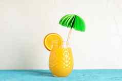 玻璃Jar装饰棕榈橙色一块颜色表格白色背景空间文本新鲜的自然喝