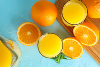 作文新鲜的橙色汁<strong>玻璃</strong>器皿薄荷<strong>切割</strong>董事会橙子颜色背景前视图新鲜的自然喝