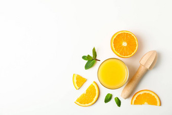 平躺作文橙色汁橙色块薄荷木榨汁机白色背景空间文本自然饮料水果