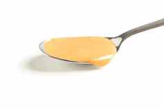 奶油花生黄油勺子孤立的白色背景特写镜头传统的产品美国厨房