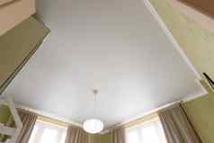 拉伸白色不光滑的天花板特写镜头吊灯室内生活卧室