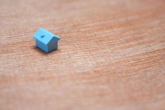 最小的设计单微型房子复制空间蓝色的玩具首页财产市场住房抵押贷款贷款象征房子木背景真正的房地产买出售首页图标财产房子模型