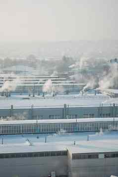 工厂烟囱吸烟冬天季节概念空气污染环境污染工业浪费