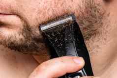 男人。剃须修剪胡子头发限幅器