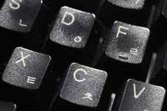 特写镜头移动PC电脑键盘黑色的键白色信数字