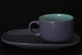 紫色的茶一对黑色的背景