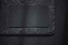 黑色的业务卡黑暗石头平铺背景阳光阴影奢侈品品牌平躺品牌身份设计模型