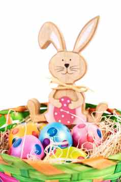 复活节兔子色彩鲜艳的鸡蛋波尔卡点篮子