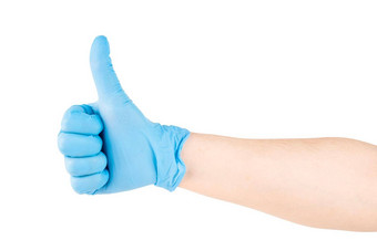 高加索人手蓝色的乳胶医疗手套显示拇指手势