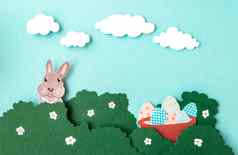 快乐复活节一天背景兔子隐藏了灌木纸减少风格Diy纸艺术海报横幅背景壁纸复制空间