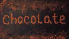 登记巧克力使可可粉除了块巧克力巧克力粉红色的黑色的白色胡椒黑色的石墨背景