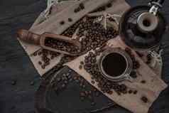 咖啡风格杯咖啡咖啡豆子旋转木独家新闻咖啡豆子木黑暗石头背景