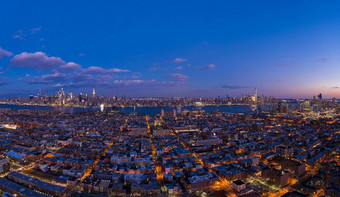 城市城市景观较低的曼哈顿泽西岛城市哈德逊河纽约晚上《暮光之城》空中视图曼联州美国