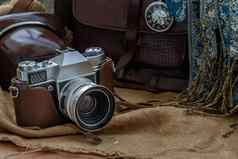 古董照片相机棕色（的）皮革袋围巾口袋里看袋布背景