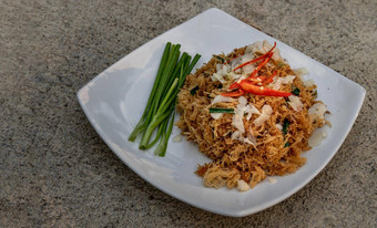 亚洲吃食物跟grob甜蜜的酸<strong>脆皮</strong>面条使泰国大米面条甜蜜的酸酱汁白色板甜蜜的酸<strong>脆皮</strong>大米面条