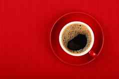 杯黑色的即时咖啡红色的飞碟