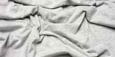斑驳的灰色的棉花织物服装织物有皱纹的