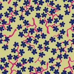 无缝的模式开花日本樱桃樱花分支机构蓝色的花米色背景