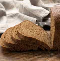 切片烤矩形黑麦面粉面包棕色（的）董事会健康的食物