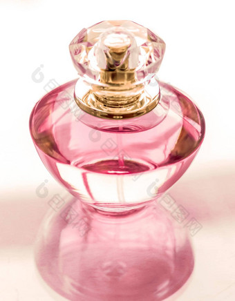 粉红色的香水瓶光滑的背景甜蜜的花气味魅力香味水香水假期礼物奢侈品美化妆品品牌设计