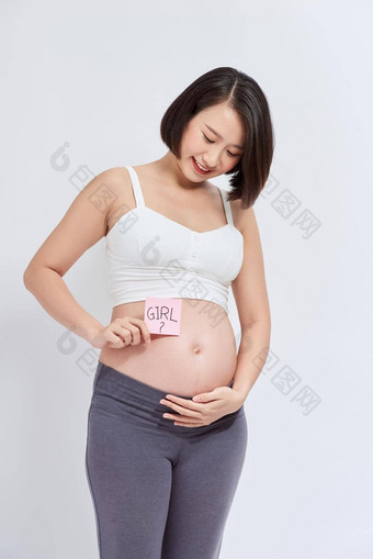怀孕了女人黏糊糊的请注意女孩肚子孤立的白色背景