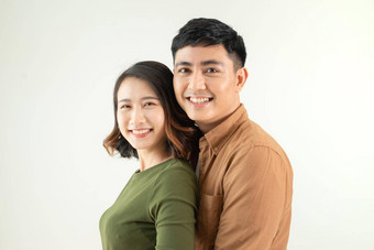 肖像年轻的夫妇<strong>微笑</strong>白色背景