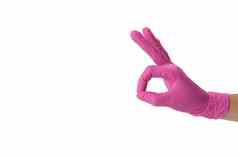 手粉红色的医疗手套显示手势白色backgroundc