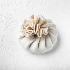 自制的传统的中国人锅炸饺子塑料托盘白色石头表面广场格式