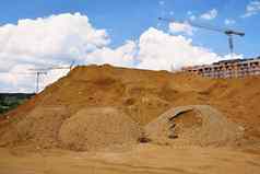 桩沙子建设房屋概念行业起重机蓝色的天空云太阳建筑建设网站日落