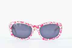 太阳镜婴儿粉红色彩斑斓的眼镜孤立的清洁白色背景