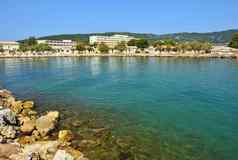 美丽的海滩船清洁海湾概念旅行假期旅游伟大的的地方夏天假期游泳科孚岛岛希腊