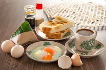 东方早餐集马来西亚组成咖啡<strong>米饭</strong>脂肪烤<strong>面包面包</strong>半熟的蛋
