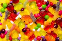 甜蜜背景糖果各种各样的布局耐嚼的果酱小焦糖明亮的背景糖果味道文章糖果
