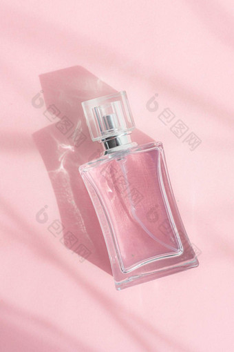 瓶香水粉红色的背景粉红色的香水气味芳香疗法文章的地方文本选择香水香味光阴影复制空间