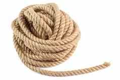 线圈自然黄麻黑森绳子绳编织扭曲的孤立的白色背景