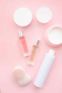 布局粉红色的奶油背景美容护理化妆品皮肤护理罐子奶油粉红色的背景复制空间文章选择奶油水疗中心