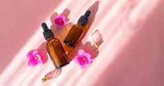 化妆品石油花粉红色的背景化妆品程序健康的皮肤皮肤护理粉红色的背景文章护理化妆品
