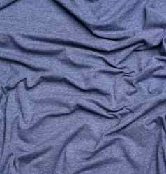 皱纹蓝色的棉花织物缝纫t恤服装