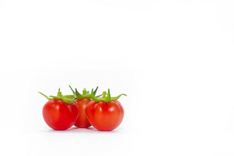 樱桃西红柿孤立的白色背景成熟的红色的西红柿绿色尾巴新鲜的水果孤立的背景复制空间西红柿白色背景