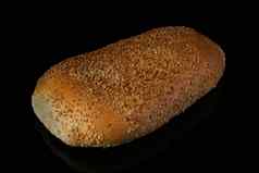面包面包切片芝麻种子黑色的背景面包