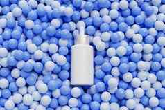 模型白色下降瓶血清化妆品产品广告谎言蓝色的球球体摘要渲染