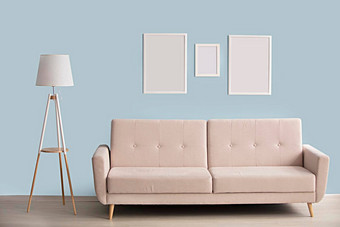极简主义室内沙发灯<strong>图片</strong>帧蓝色的墙背景