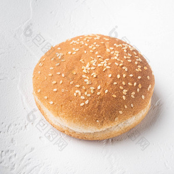 新鲜的自制的<strong>汉堡</strong>面包芝麻广场格式白色石头背景