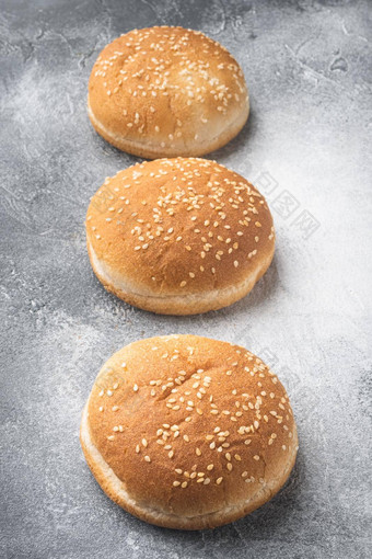 汉堡轮面包使快食物三明治灰色的背景
