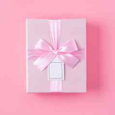 美丽的礼物盒子丝带弓粉红色的背景
