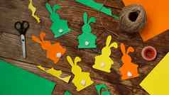 复活节小兔子使纸木背景创建装饰复活节