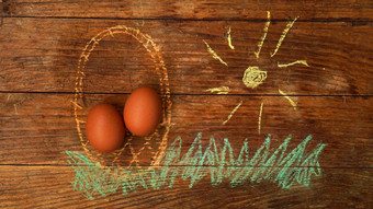 复活节鸡蛋篮子画彩色的粉笔木背景