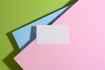空白矩形业务卡谎言现代明亮的绿色背景蓝色的粉红色的表纸影子